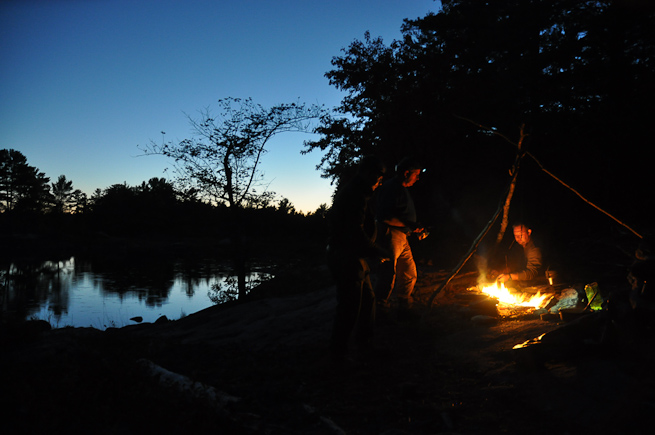 Campfire in twighlight on the French River