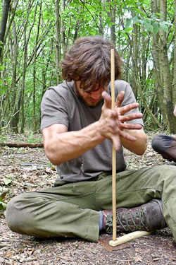 Student on the Intermediate Wilderness Bushcraft course practising hand-drill