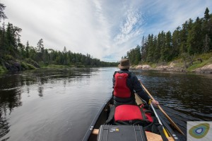 First person point of view from stern seat of tandem canoe on the Bloodvein river, Manitoba