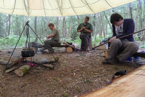 Carving and whittling under the parachute.