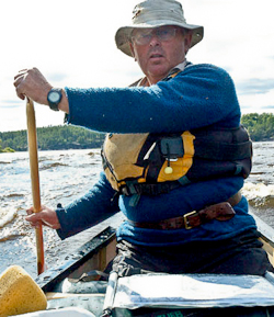 Ray Goodwin canoeing Bloodvein River