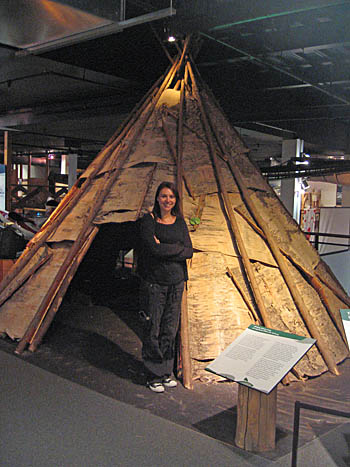 Reconstruction of a Mi'kmaq birch bark covered winter camp shelter