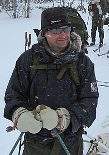 Steve Suggett dressed in cold weather gear during a Nordic ski tour