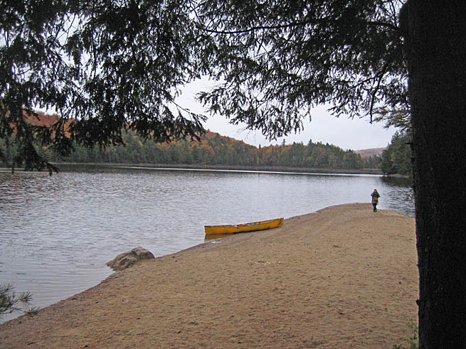 Canoe on a beach in Algonquin in the fall