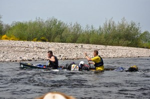 Canoe still afloat despite being full of water.