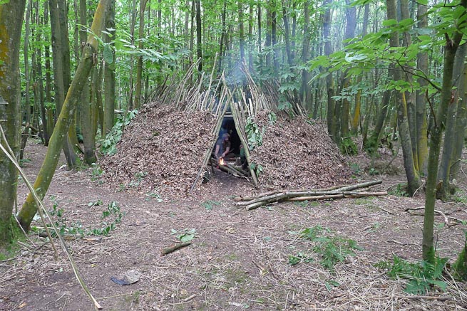 Accomplished shelter building on Frontier Bushcraft course