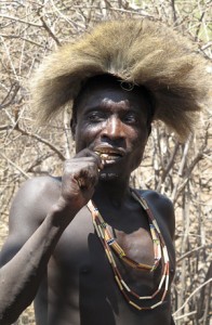 Hadza Man Chewing Baobab Branch