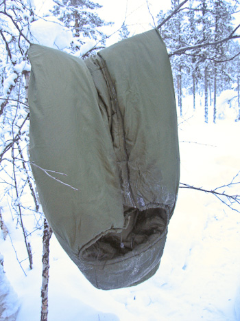 Frosted sleeping bag in arctic forest