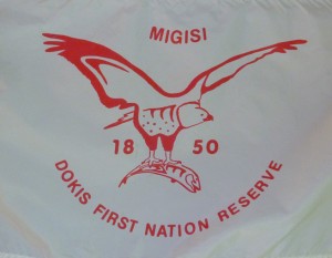 The flag of the Dokis First Nation featuring and eagle fishing
