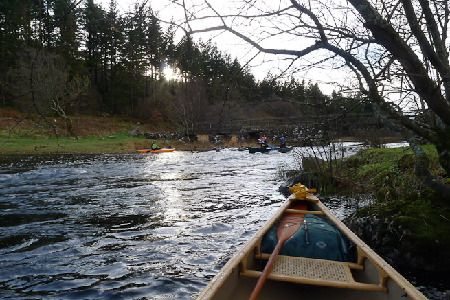 Paddlers on a small rapid