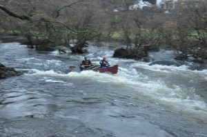 Running white water in a canoe