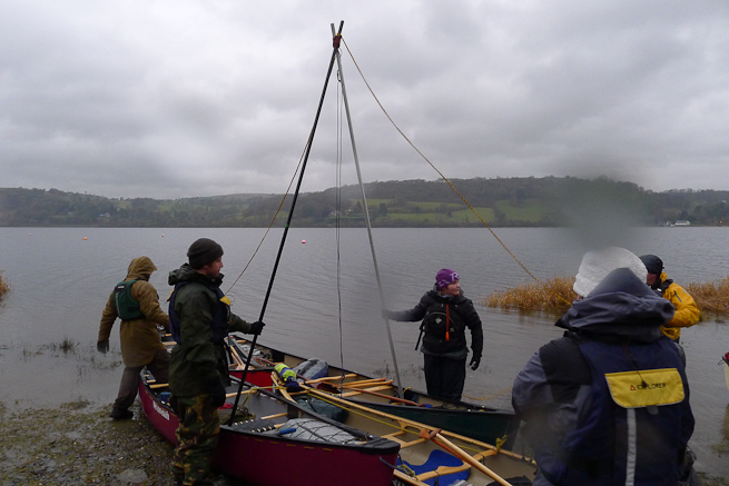 Canoe sailing rig being erected