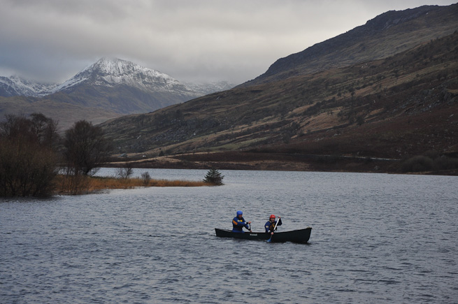 Canoe on lake with Snowdon in background