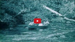 Men in a Canadian birch bark canoe