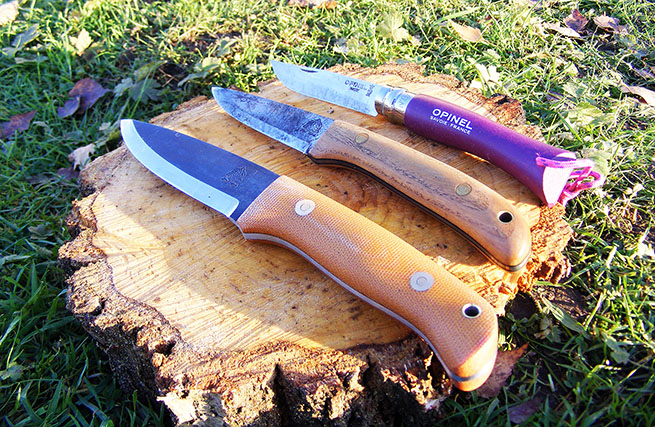 An Opinel No 7 folding knife along with a Ben Orford Craftsman knife and Ben Orford Woodlander knife