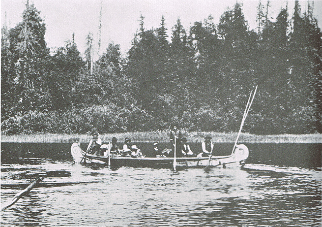 Fur trade canoe black and white photograph
