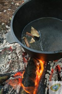 Cooking in Dutch oven over fire
